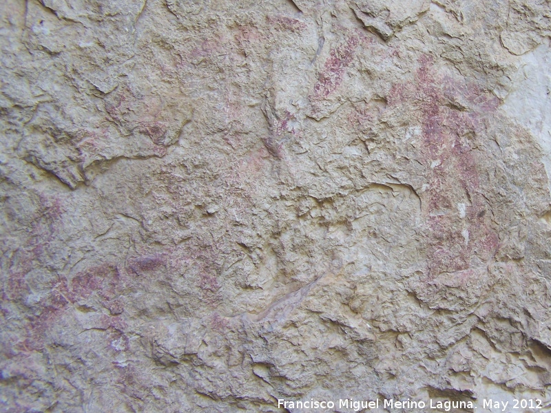 Pinturas rupestres de la Cañada de la Corcuela - Pinturas rupestres de la Cañada de la Corcuela. Antropomorfos bajos capturando a las cabras