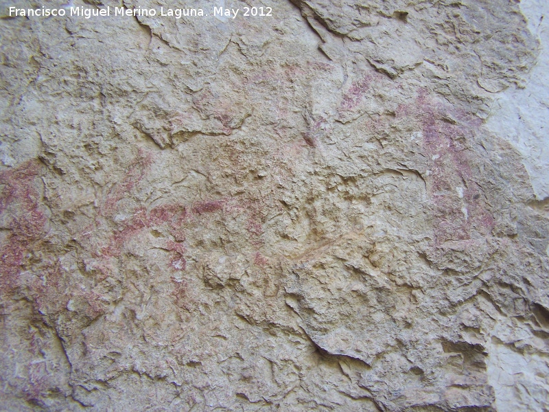 Pinturas rupestres de la Cañada de la Corcuela - Pinturas rupestres de la Cañada de la Corcuela. Antropomorfos bajos capturando a las cabras