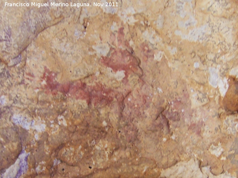 Pinturas rupestres del Abrigo I de la Pedriza. Grupo III - Pinturas rupestres del Abrigo I de la Pedriza. Grupo III. Antropomorfo con tocado y apéndices en mano izquierda