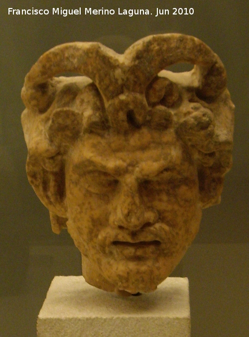 Oppidum Torrebenzalá - Oppidum Torrebenzalá. Dios Pan en mármol tallado siglos I-II. Museo Arqueológico Provincial
