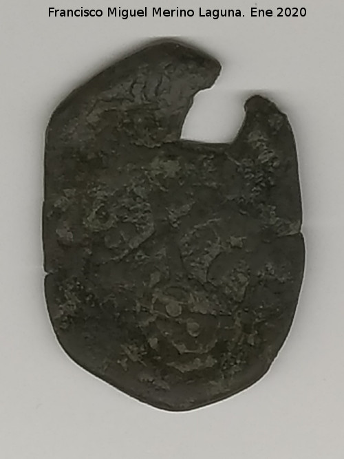 Palacio ibero del Cerro de la Merced - Palacio ibero del Cerro de la Merced. Moneda de cobre de los Austrias siglo XVIl con sucesivos resellos, el �ltimo de ellos 1659. Exposici�n Museo Ibero Ja�n