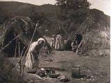 Carboneros en la Provincia de Jaén. Chozas de rancheros en el monte" es Arturo Cerdá y Rico (finales del siglo XIX)
