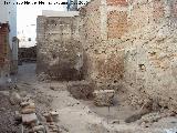 Muralla de Jaén. Torreones y lienzos de la Calle Millán de Priego nº 71. Quiebros de la muralla desde el solar que da al callejón que sube a la Plaza Cambil