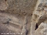Muralla de Jaén. Torreones y lienzos de la Calle Millán de Priego nº 71. Junta de la tubería con la canalización de aguas dentro de la muralla