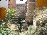 Muralla de Jaén. Torreones y lienzos de la Calle Millán de Priego nº 71. Restos después de haber construido el edificio en el solar que da al callejón que sube a la Plaza Cambil