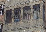 Casa de las Cariátides. Balcón cerrado a la Plaza del Pósito