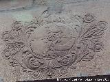 Casa de la Calle Bartolomé Camacho nº 6. Escudo