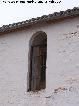 Iglesia de Santa María del Collado. Ventana de arco de medio punto del torreón