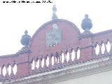 Casa de la Calle Fugitivos nº 2. Escudo
