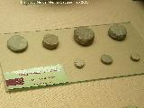 Fichas del juego Ludus latrunculorum. Museo Arqueológico Ciudad de Arjona
