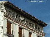 Casa de la Plaza de España nº 24. Alero y balaustrada