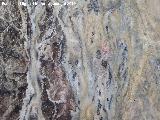 Pinturas rupestres de la Cueva Secreta Grupo V. Restos de pinturas tapados por incrustaciones calcáreas