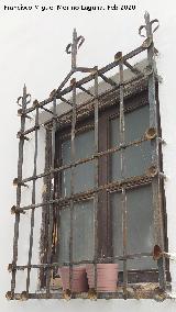 Casa de la Calle Horno de San Pablo n� 7. Reja de rosetas con picas