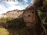 Castillo de La Hueta. Continuación de las murallas