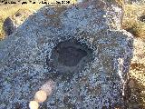 Petroglifos de Alicún de las Torres. Piedra II. Sol o gran cazoleta con desagües