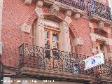 Casa del Pasaje del Comercio nº 21. Balcón inferior