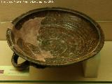 Cerámica vidriada cristiana. Plato de cerámica vidriada siglo XV. Museo Arqueológico Ciudad de Arjona